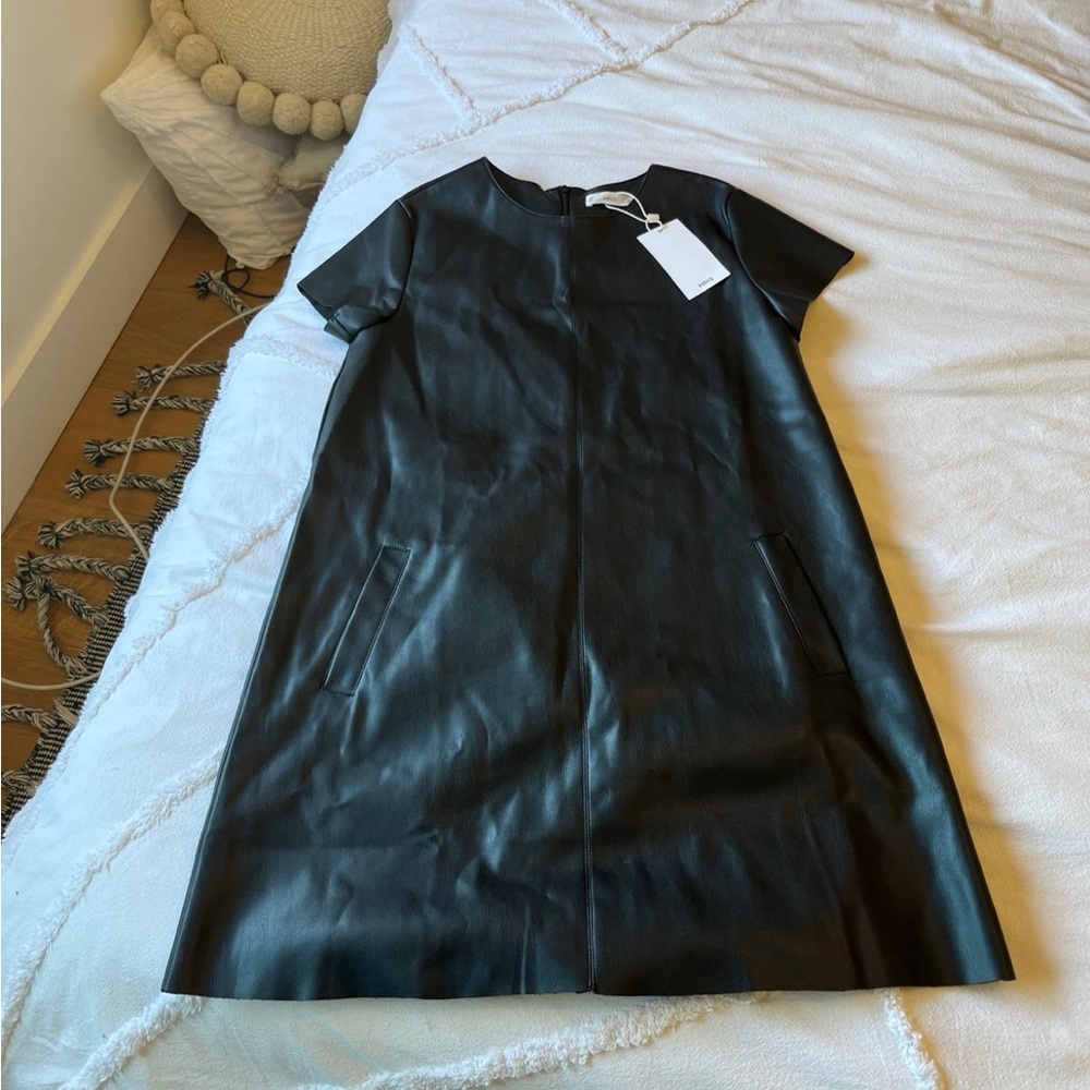Girls black leather dress. never worn. tags on